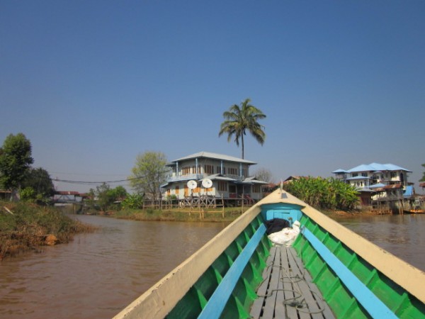 Satellite dishes on the old stilt houses of Inle lake.